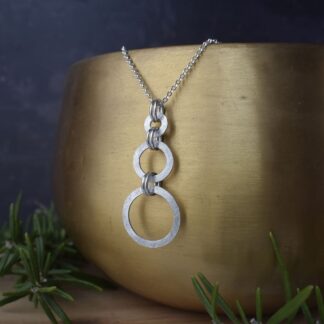 Silver Drop Pendant Necklace with Three Textured Open Circles