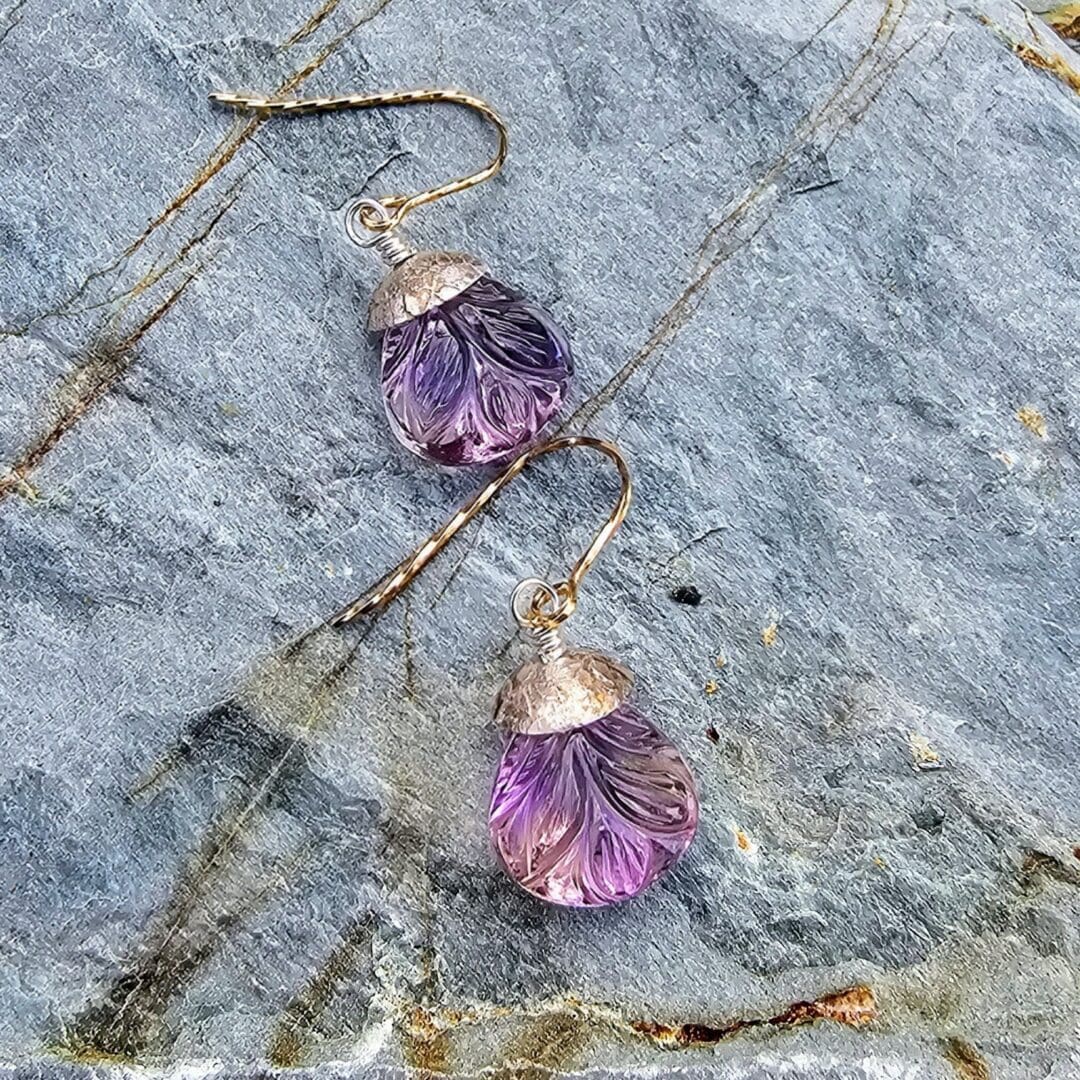 Pair of carved ametrine teardrop earrings with leaf motifs, finished with aged sterling silver and rolled gold twist hooks, side, Isobel Kelly Jewellery.