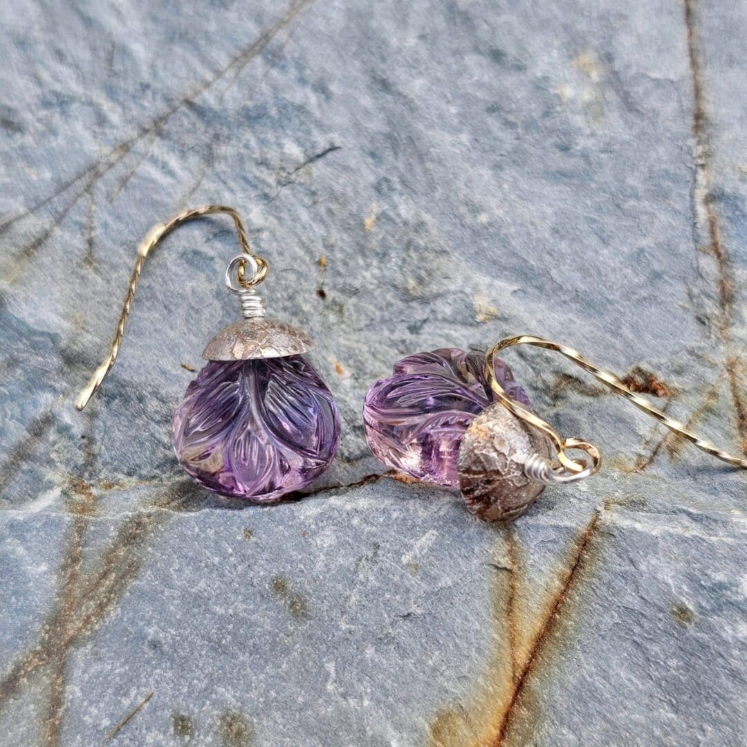 Pair of carved ametrine teardrop earrings with leaf motifs, finished with aged sterling silver and rolled gold twist hooks, cap detail, Isobel Kelly Jewellery.