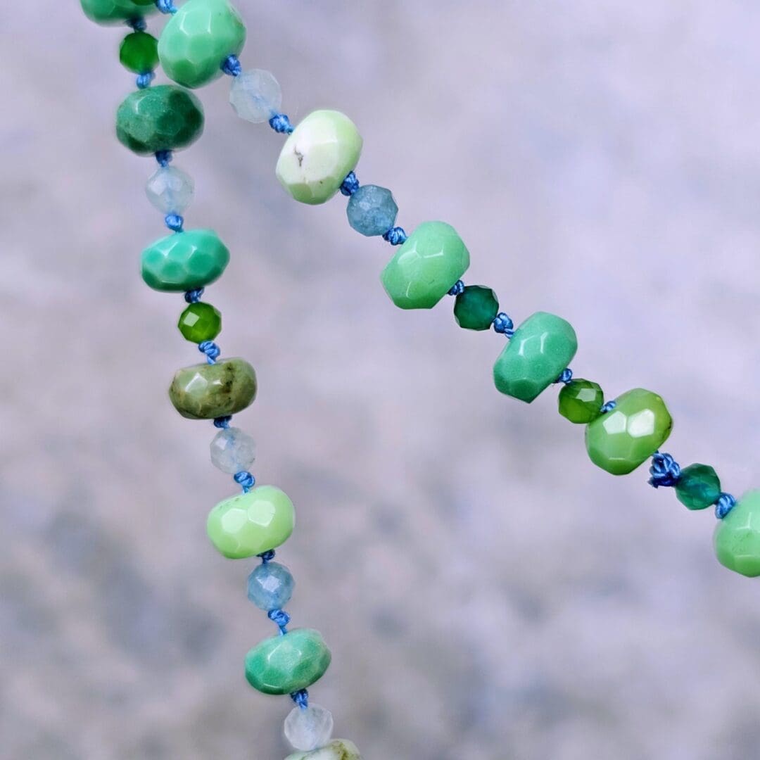Silver leaf pendant set with lab emerald, topaz, tsavorite and spinel, bead detail, Isobel Kelly Jewellery