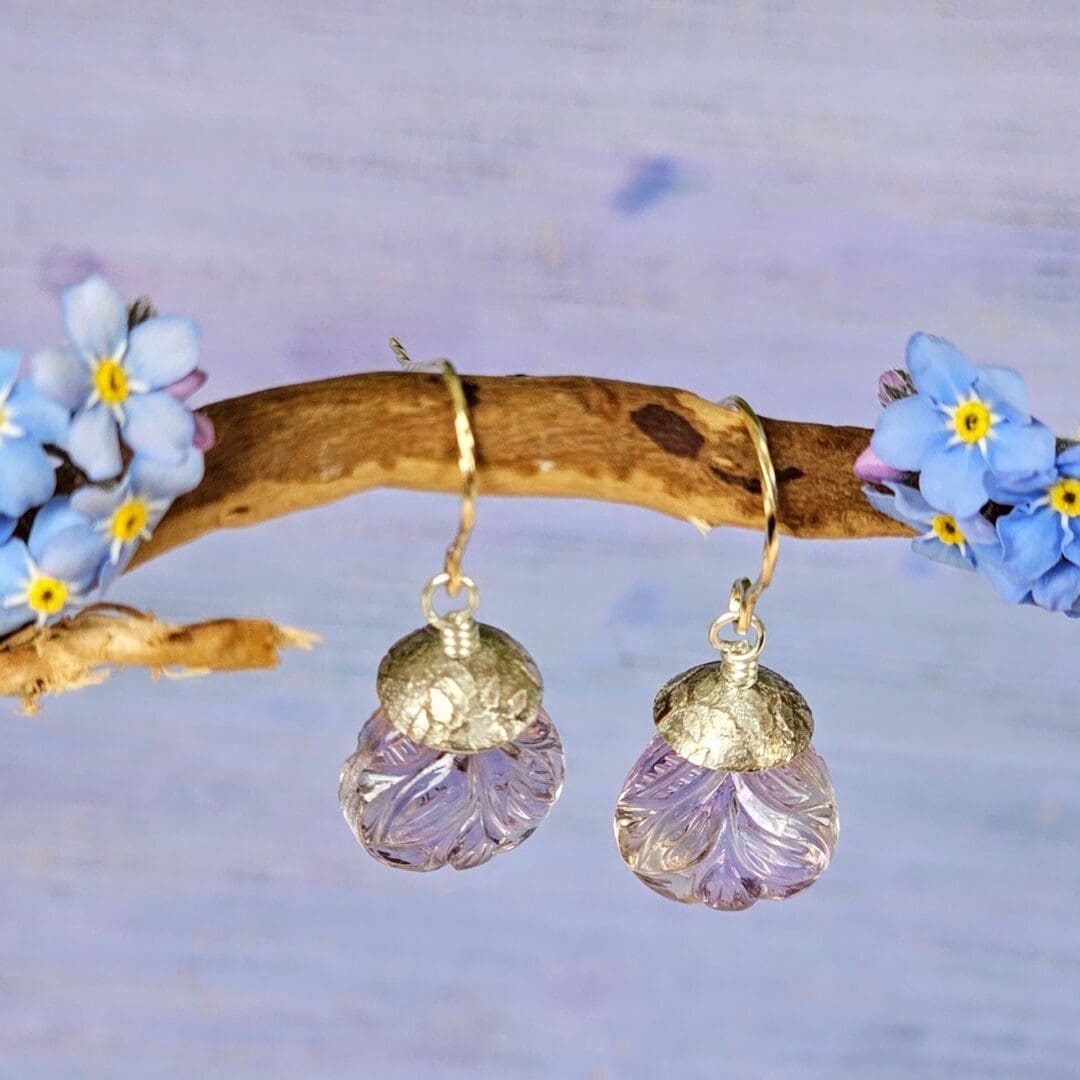Pair of carved ametrine teardrop earrings with leaf motifs, finished with aged sterling silver and rolled gold twist hooks, hanging cup detail, Isobel Kelly Jewellery.