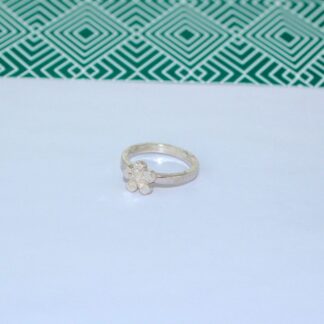 Sterling silver flower ring with textured ring band