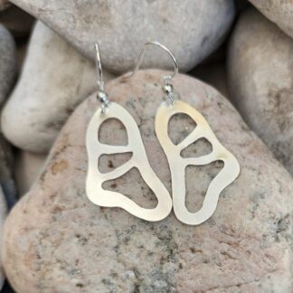 Kidney-shaped-earrings-handpierced-in-sterling-silver
