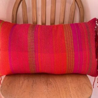 Long cushion with fringing, hand crafted from British wool