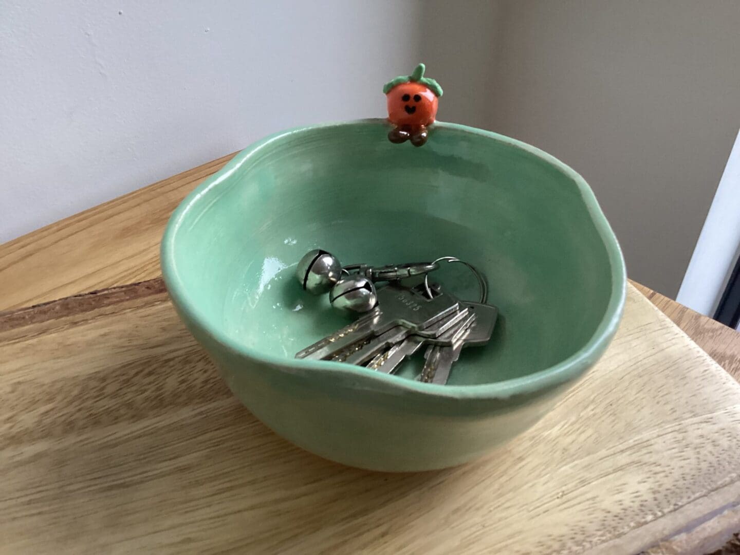 Handmade Ceramic Trinket Bowl with Smiley Orange Decor - Image 3