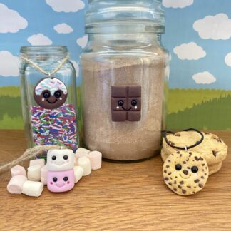 Four cute, smiling, hot chocolate kitchen jar tags the set includes a chocolate bar, a chocolate chip cookie, stacked marshmallows, and a frosted cookie with sprinkles.