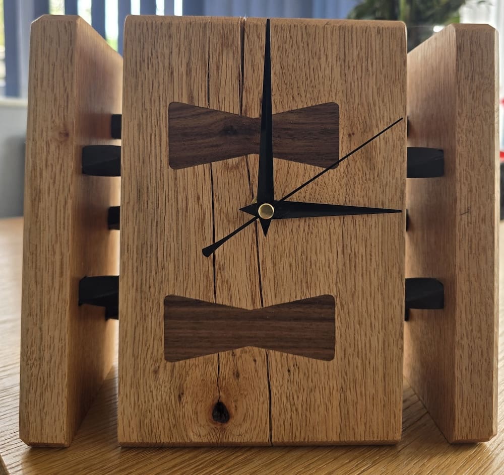 Contemporary oak mantel clock with minimalist face and black hands