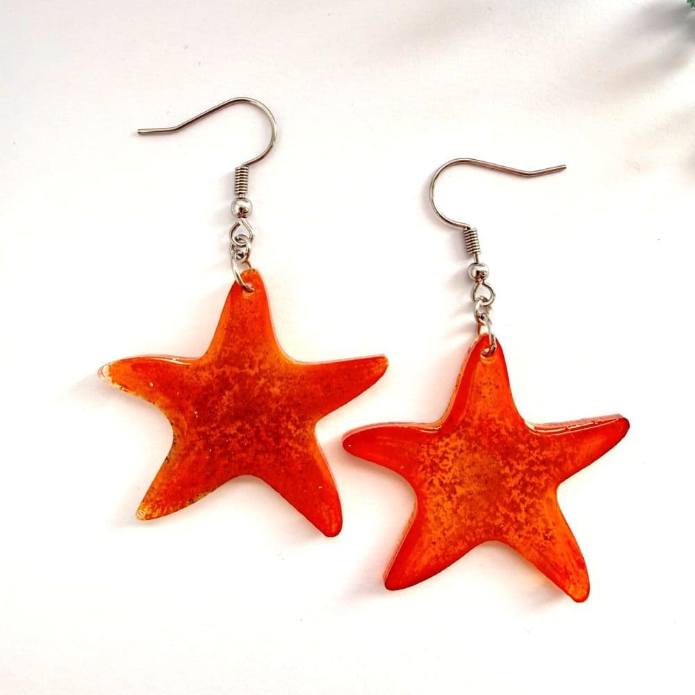 Flatlay showing back of Starfish marine inspired earrings made by Copper Magpie Designs.
