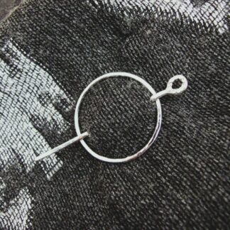 Silver shawl pin with copper accents