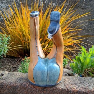 Silver Spurs Cowboy Ceramic Sculpture