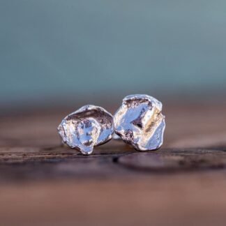 Small recycled silver stud earrings organically shaped and cast into water so each earring is unique and each pair is mismatched