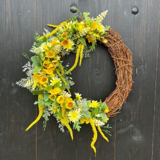 Yellow artificial front door wreath