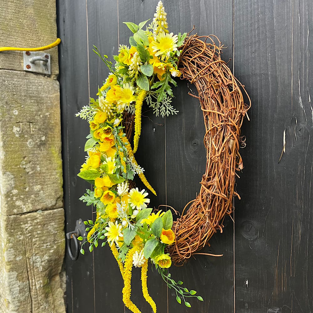 Yellow artificial front door wreath