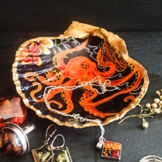 Large decoupaged scallop shell dish with an octopus design, suitable for jewellery or small trinkets.