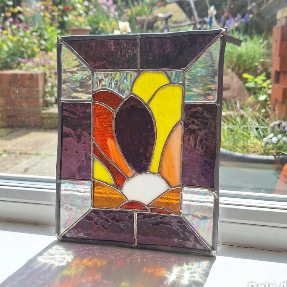 Close-up of textured and iridescent glass in stained glass panel