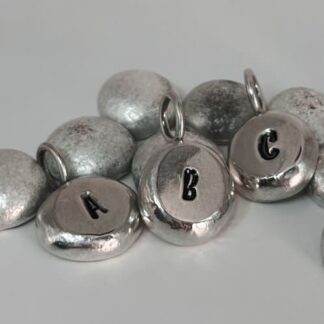 Handmade personalised sterling silver pebble pendant