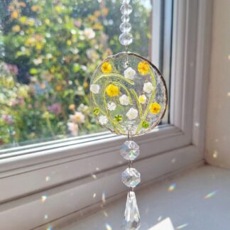 Handmade fused glass suncatcher with pressed meadow flowers and hanging crystal prism