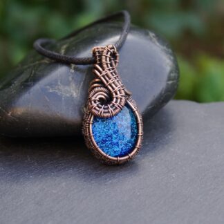 Copper wire wrapped pendant with blue dichroic glass by Oruki Design
