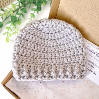 crochet baby beanie hat, made with 2 strands of double knit yarn for texture and warmth. Pictured in shade silver