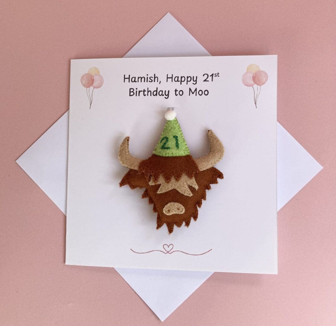 Personalised birthday card with a removable handmade highland cow decoration