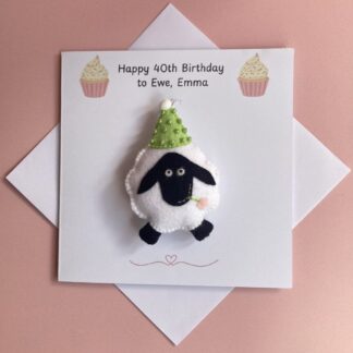 Cute handmade felt sheep with green birthday hat on a personalised birthday card