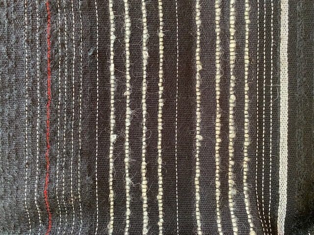 Handwoven cushion cover in classic cream,black and red. - Image 2