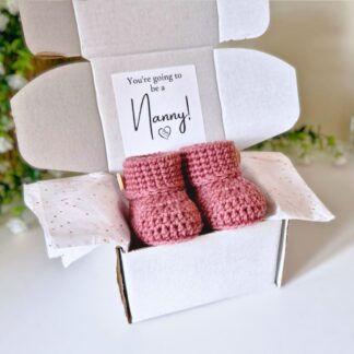 you're Going To Be a Nanny Pregnancy Announcement Gift including crochet baby booties
