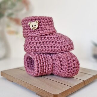 Teddy button crochet baby booties in cinder rose pink