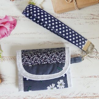 blue and white key chain small purse and wristlet
