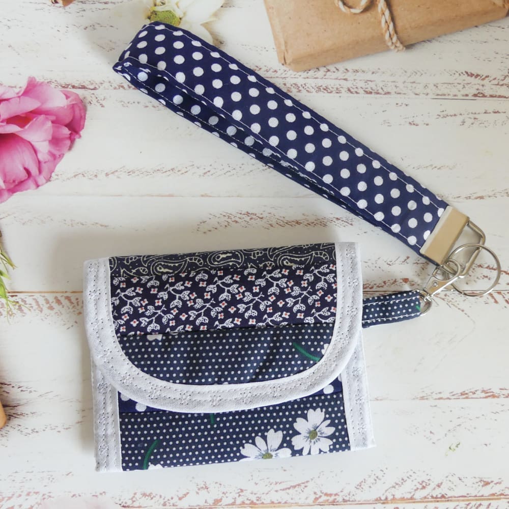 blue and white key chain small purse and wristlet