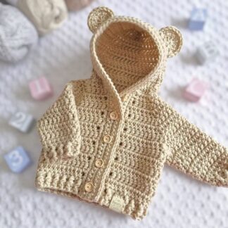 crochet Teddy Hooded Cardigan in neutral parchment colour. available in sizes newborn to 4 years