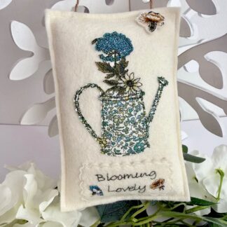 Fabric floral watering can hanging decoration for garden lovers. Whimsical garden lovers small gift