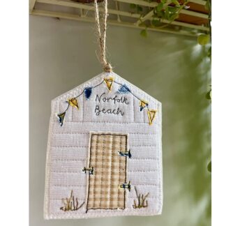 Whimsical beach hut hanging decoration, textile art with applique and personalised location