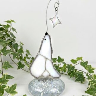 Pensive Polar Bear with Star on a glittery base