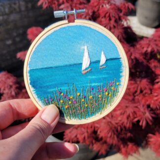Hand embroidered boat on watercolour background 4 inch hanging hoop.